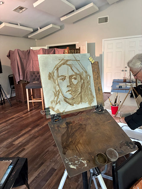Photo of a sketch of the model's head.